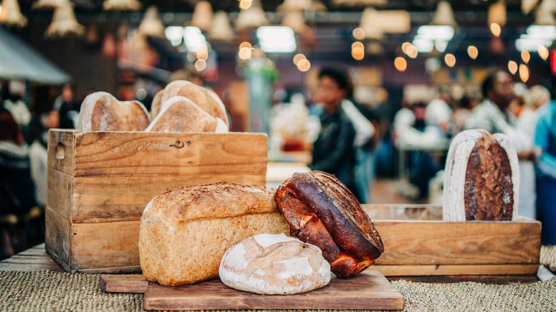 Loaves of bread in wooden boxes