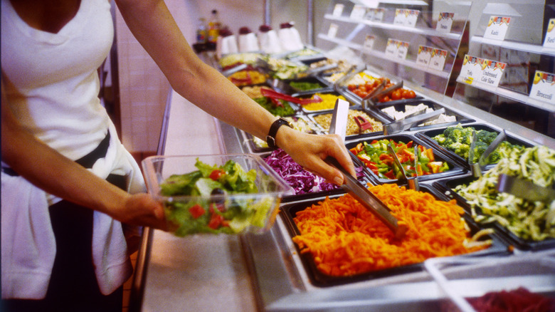 Deli case filled with salads