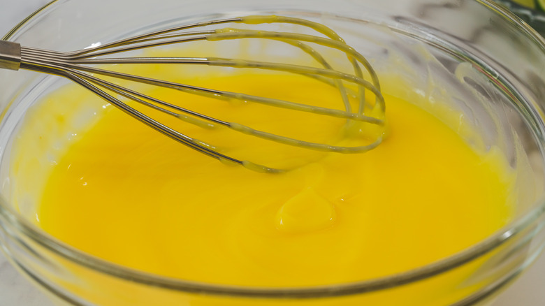 Whisk in a bowl of lemon pudding