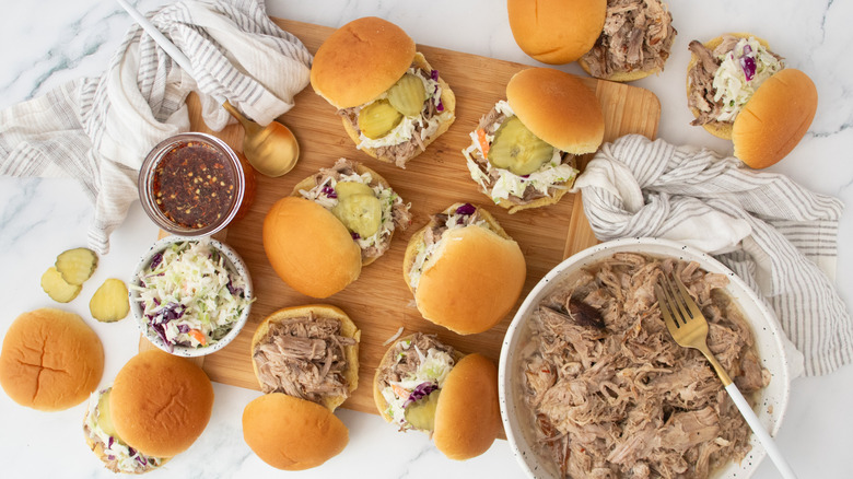 Overhead shot of several pulled pork sliders