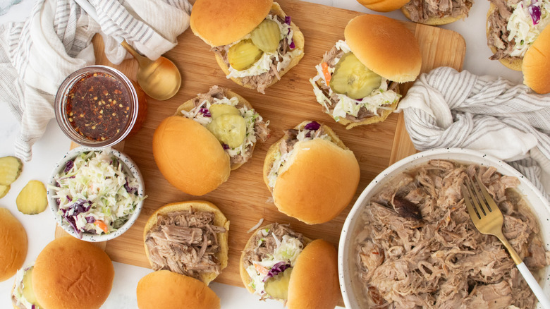 Overhead shot of several pulled pork sliders