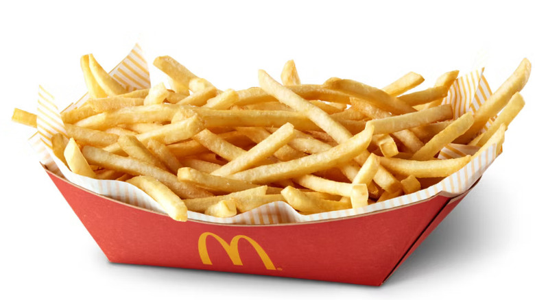 A basket of fries with the McDonald's logo on white background.