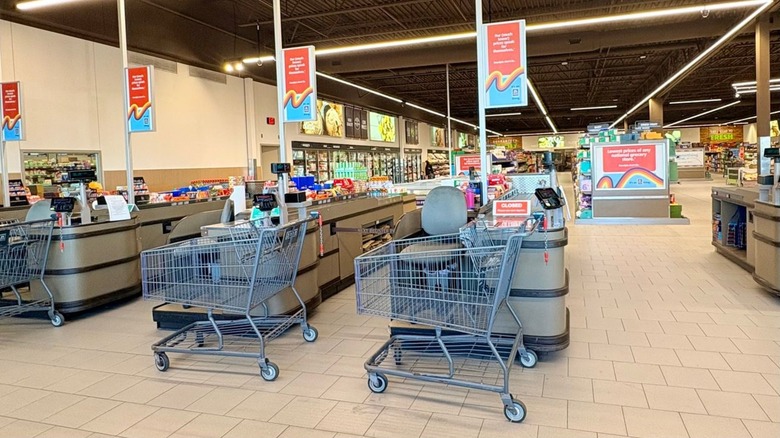 empty shopping carts at Aldi checkouts