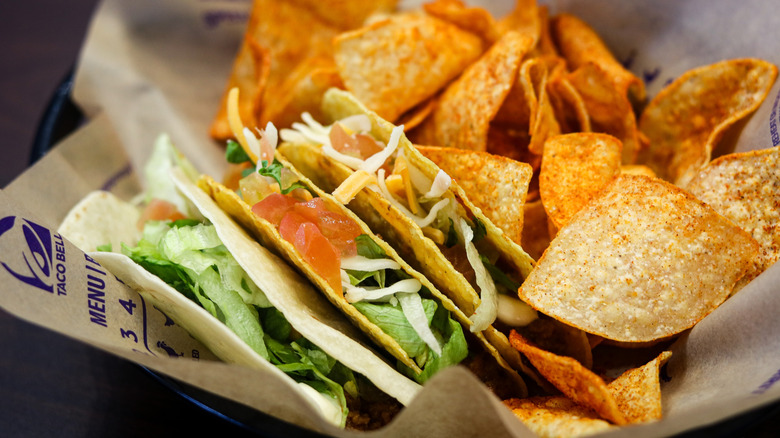 Three crunchy tacos with chips from Taco Bell