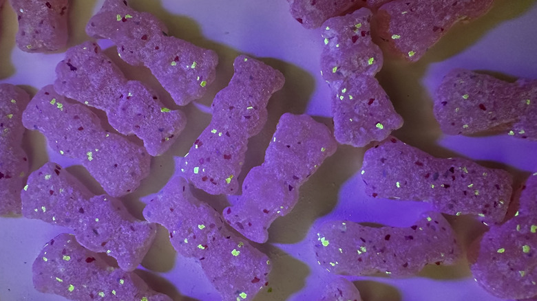 Sour Patch Kids Glow Ups glowing under black light