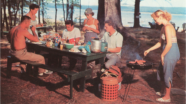 A vintage photos of a group having a cookout