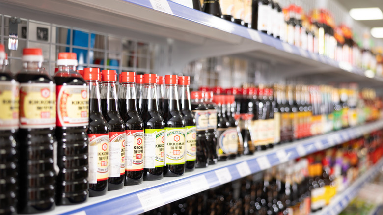 Different types of soy sauce on a store shelf