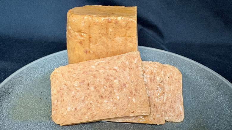 Sliced SPAM on gray plate