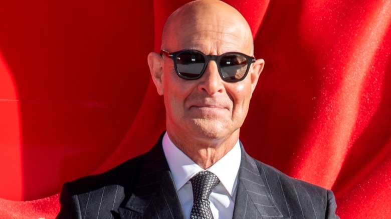 Stanley Tucci posing for photograph