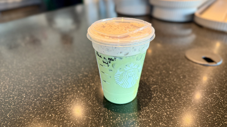 Iced Dubai Chocolate Matcha on a counter