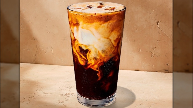 Starbucks Iced Apple Crisp Oatmilk Shaken Espresso in pint glass