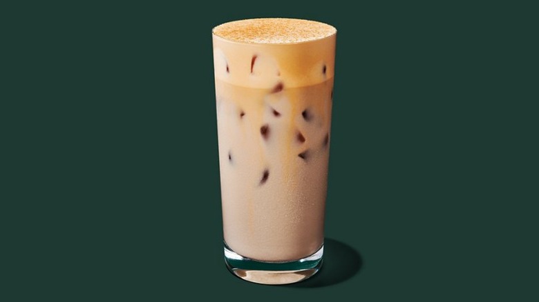A glass of the Iced Pumpkin Cream Chai from Starbucks