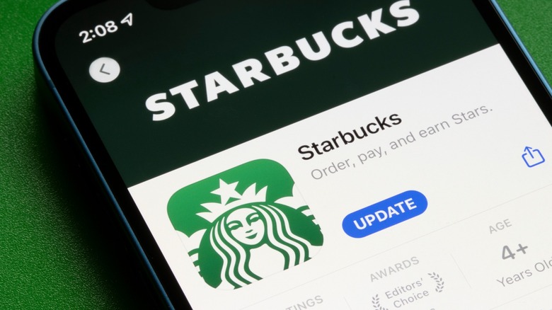 Phone displaying Starbucks app