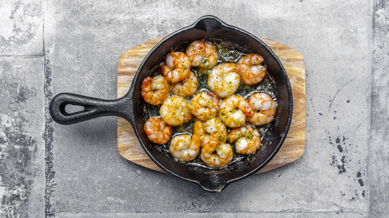 A pan of shrimp cooking