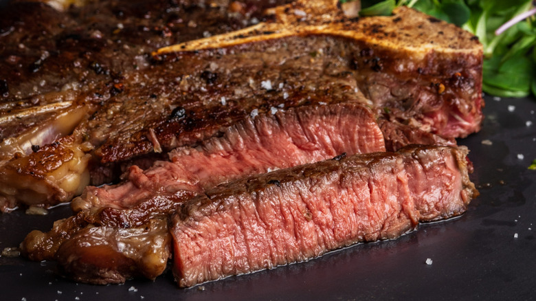 A medium-rare steak on a plate