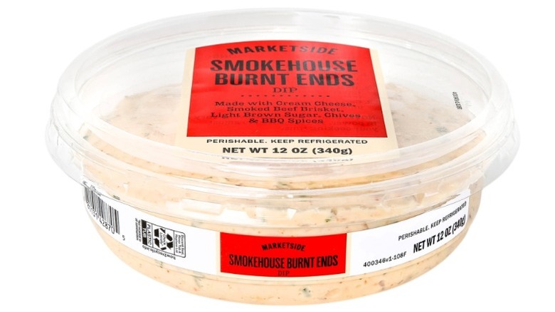 Plastic tub of Marketside Smokehouse Burnt Ends Dip on white background