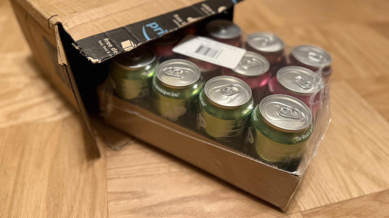 An Amazon box containing a 12 variety pack of Stiller's Soda