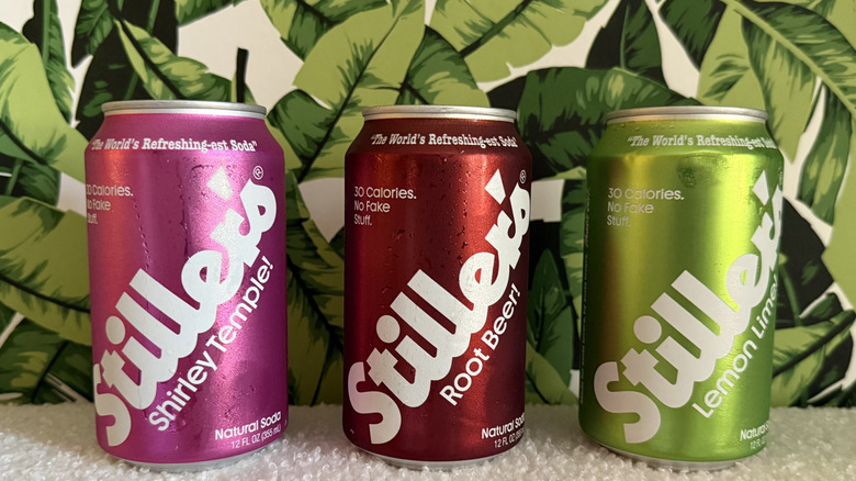 Three flavors of Stiller's Soda in cans