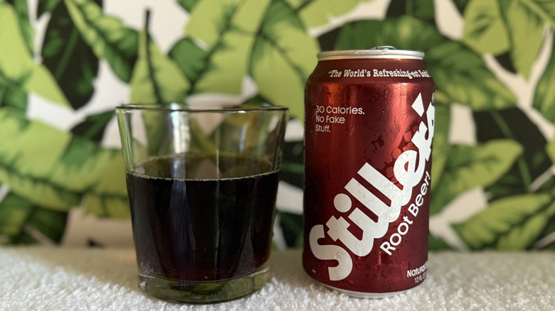 Stiller's Root Beer Soda in a glass and can