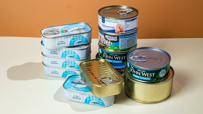 Stack of tinned fish, including tuna 