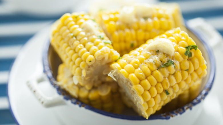 corn on the cob with butter and herbs