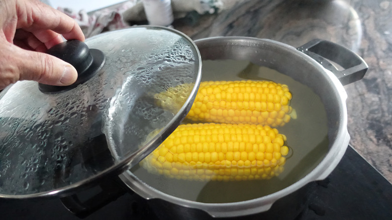 cooking two ears of corn in pot