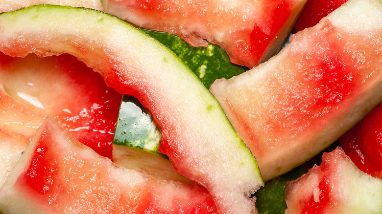 A pile of watermelon rinds with the flesh bitten off