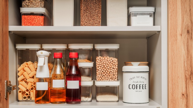 Organized pantry with clear food storage containers