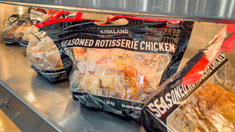 Bags of Costco's seasoned rotisserie chicken ready for purchase