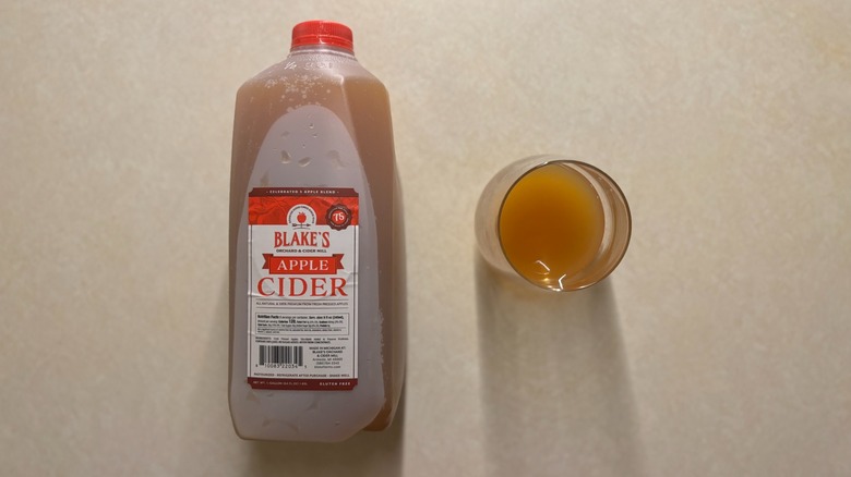 Blake's Orchard & Cider Mill Apple Cider bottle and apple cider in glass