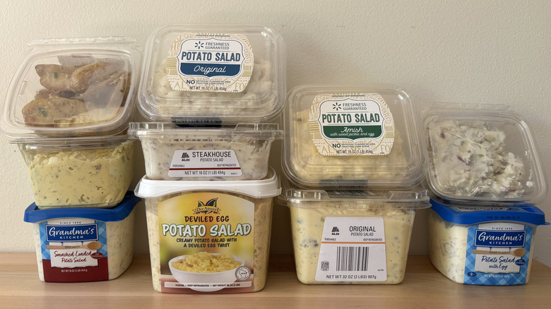 Potato salads in plastic stacked