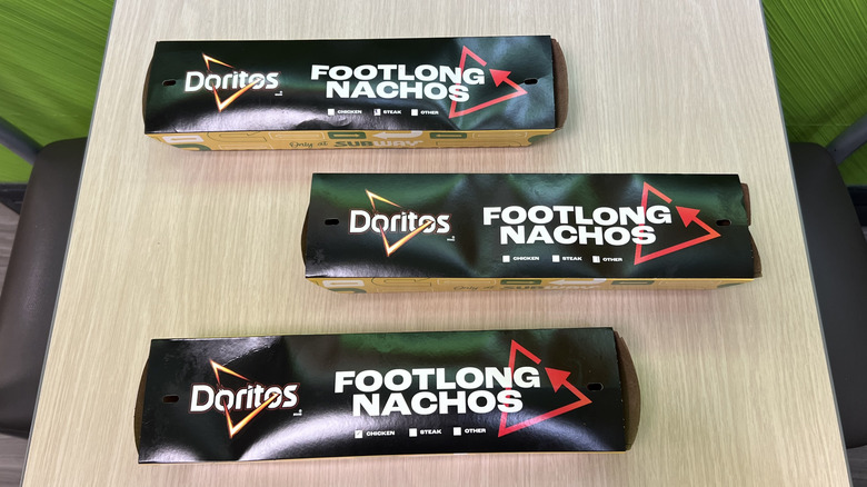 three sets of Subway's Doritos Footlong Nachos