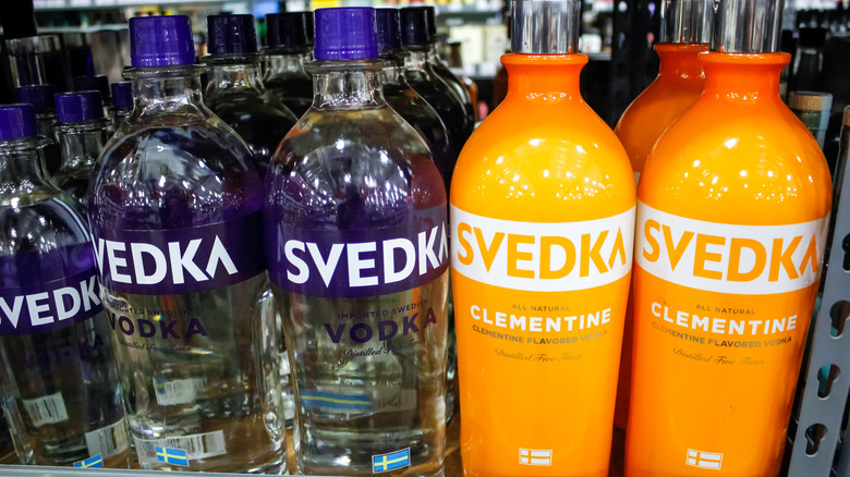 Several rows of bottles of Svedka vodka in both regular and Clementine flavor