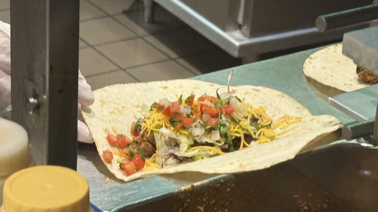 Crispy Chicken Taco being assembled