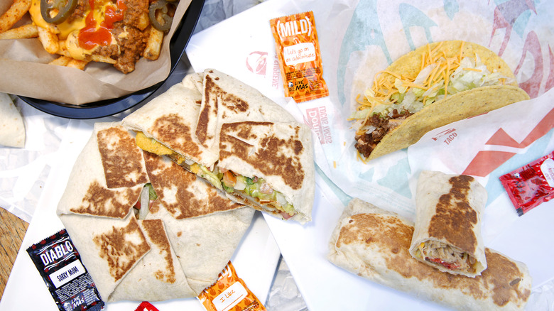 Top view of food and hot sauces from Taco Bell