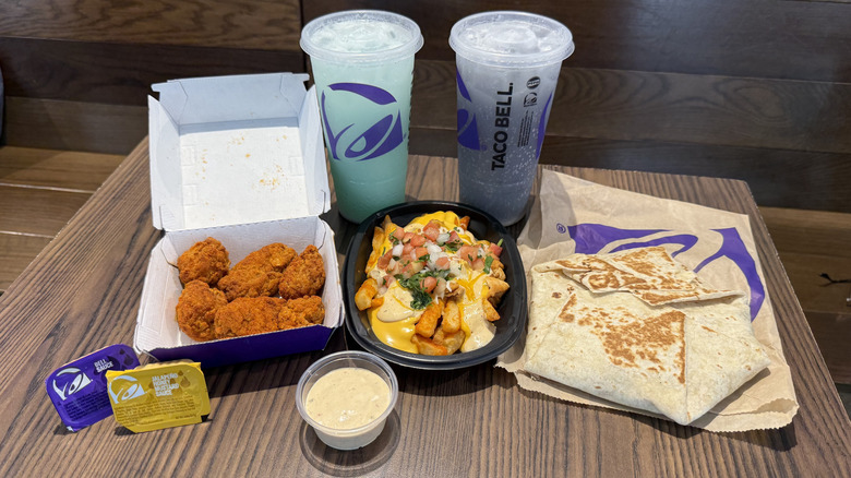 Taco Bell's new spring items for 2026 including nuggets, fries, a Crunchwrap, and drinks