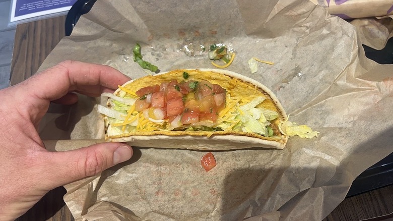 A Tajín Cheesy Gordita Crunch is seen from above on tray on table