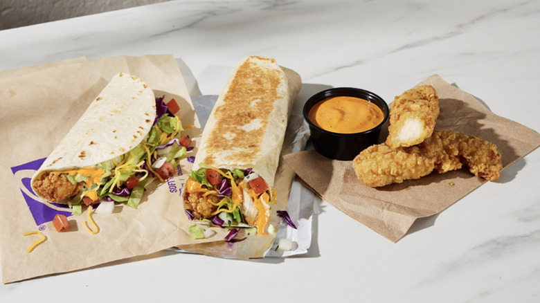 Assorted Taco Bell foods with chicken tenders