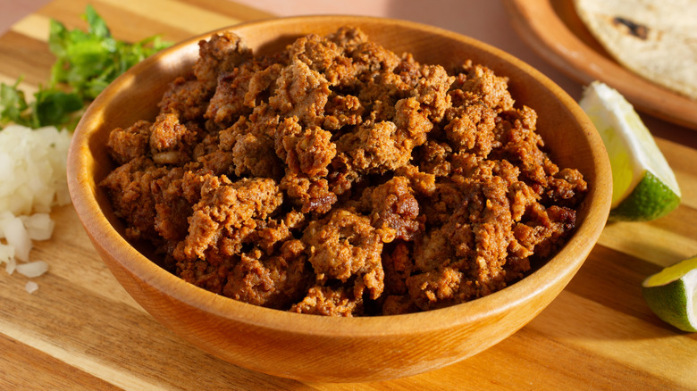 Ground taco meat in wooden bowl