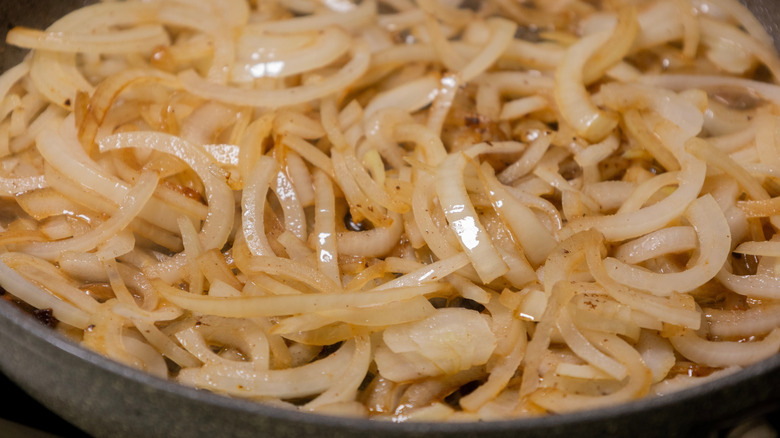 Pan filled with caramelizing onions