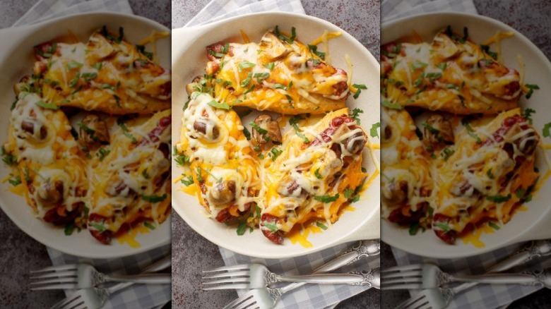 Pieces of chicken with melted cheese on top