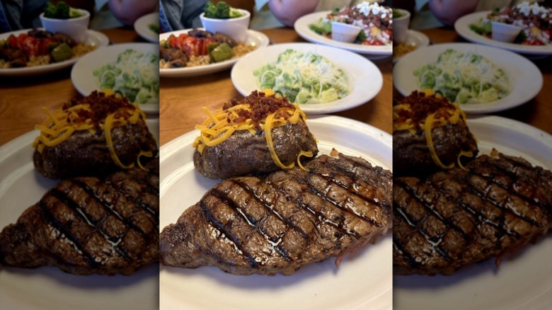 steak and baked potato at Texas Roadhouse