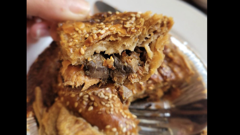 Banksia Bakehouse's chicken and mushroom pie showing the filling