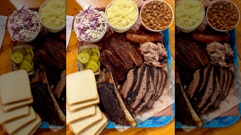 A barbecue platter including ribs, brisket, and sides