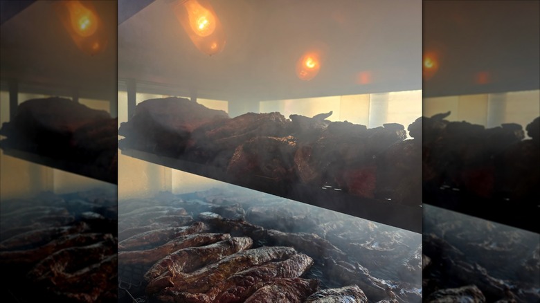 Lem's Bar-B-Q ribs cooking on the rack