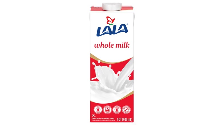 Carton of Lala whole milk on white background