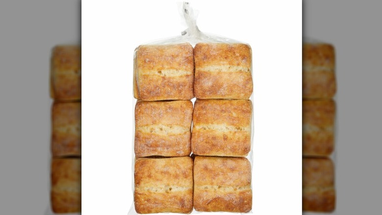 A bag of Costco's 12-pack of Kirkland Signature Artisan Rolls