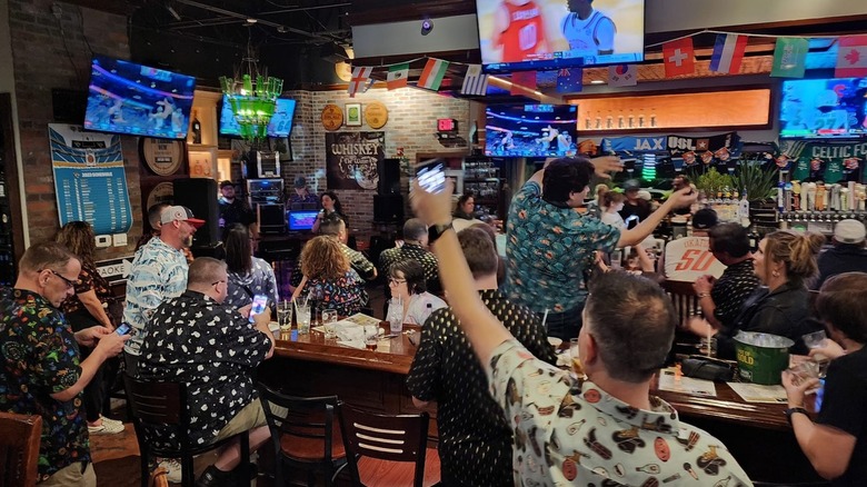 Crowded interior of Culhane's Irish Pub and Restaurant near bar counter