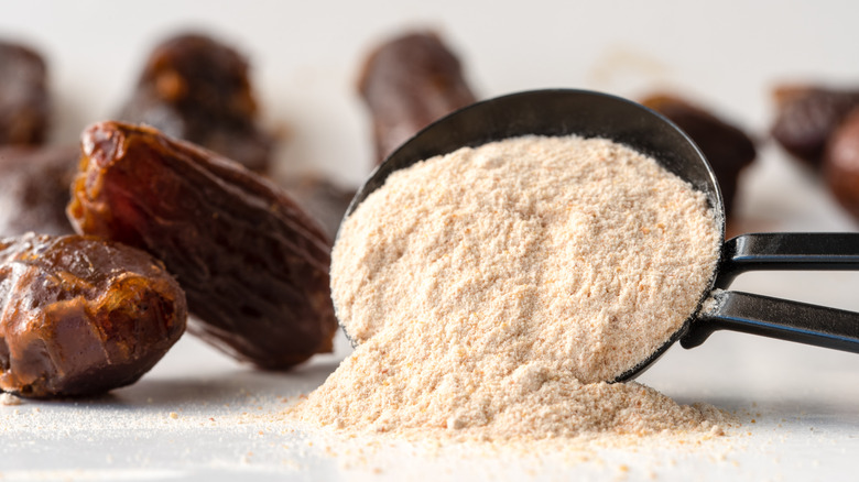 Dates and date sugar in a spoon