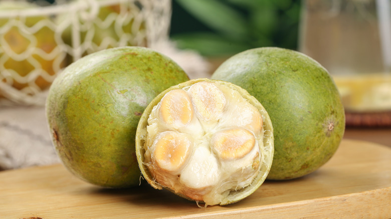 Fresh monk fruit whole and sliced